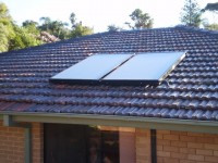 Solar hot water panels mounted on the roof.