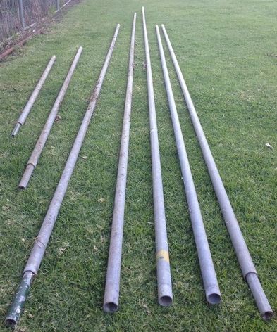 Galvanised pipe fence posts